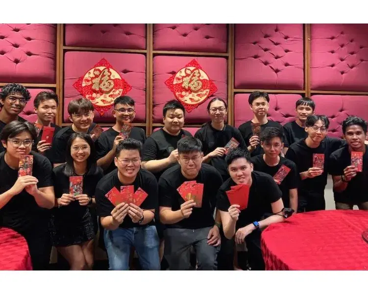 Techies Team holding red packets