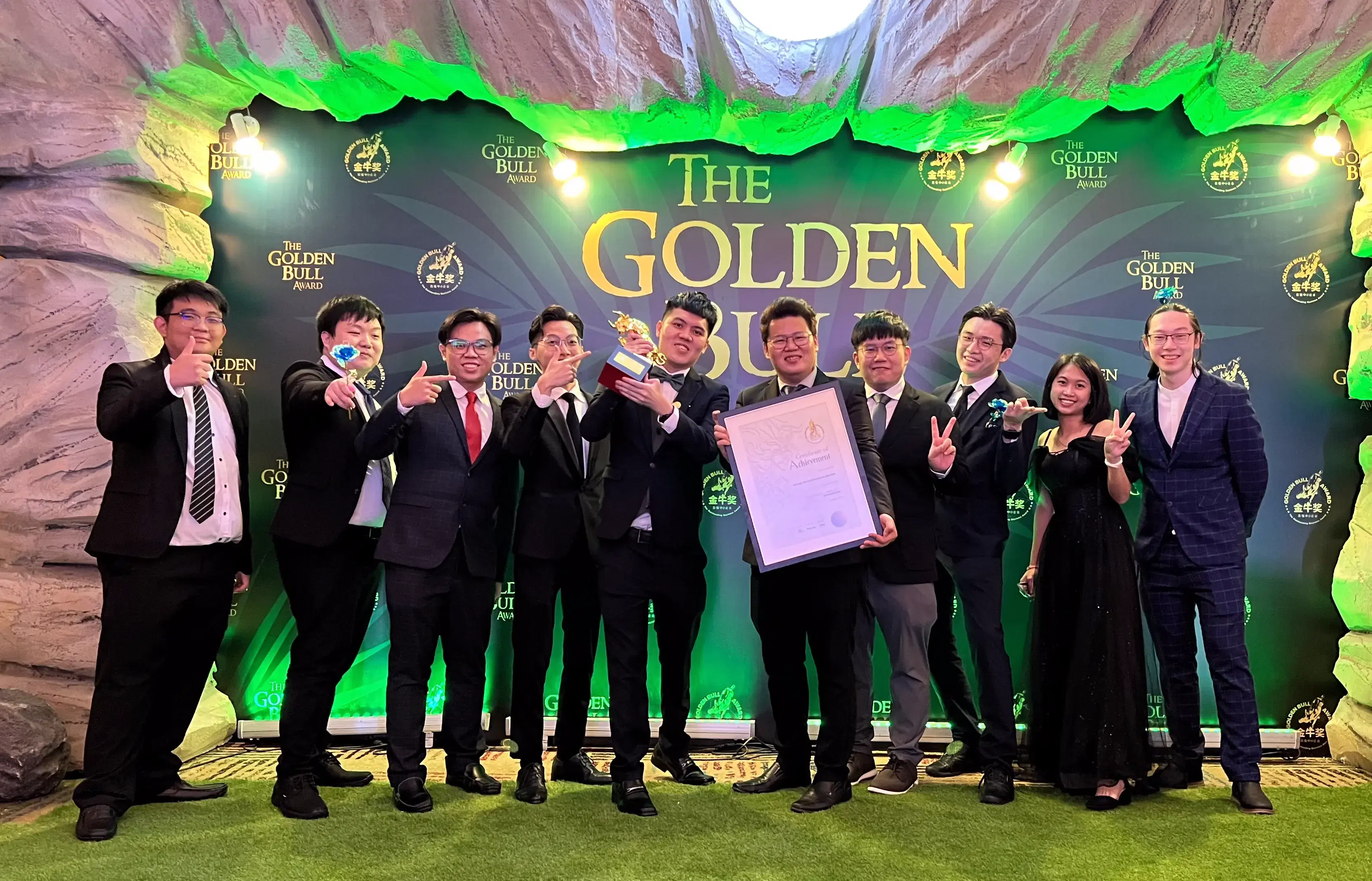 Team holding the Golden Bull Award